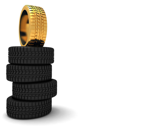 Stack of tires with gold free wallpaper for desktop - medium preview image