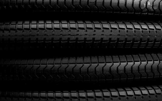 Tire closeup black background white free wallpaper for desktop - medium preview image