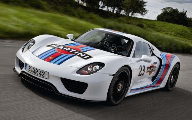 White sports car green hillside free wallpaper for desktop - medium preview image