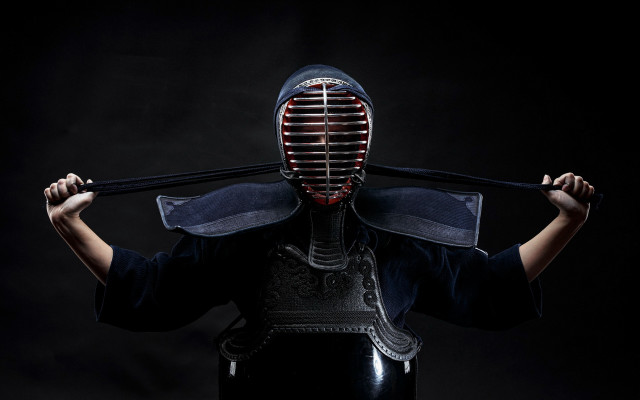 Masked character holding stick art free wallpaper for desktop - medium preview image