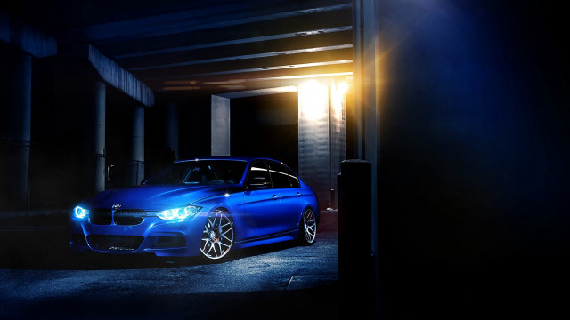 Blue car parking garage headlight free wallpaper for desktop - medium preview image