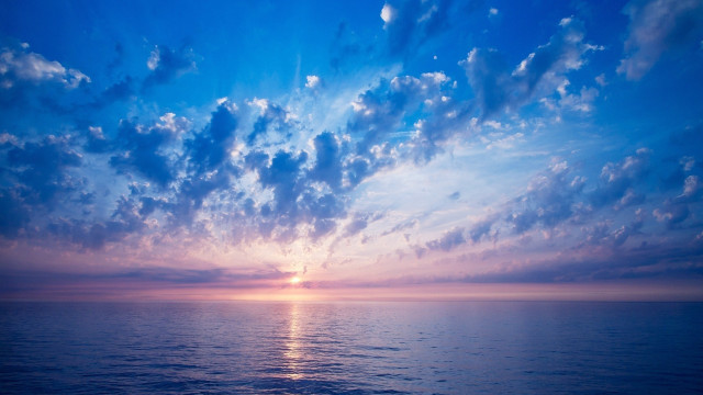 Sunset ocean clouds horizon beach free wallpaper for desktop - medium preview image