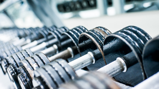 Dumbbells gym rack blurry bokeh free wallpaper for desktop - medium preview image