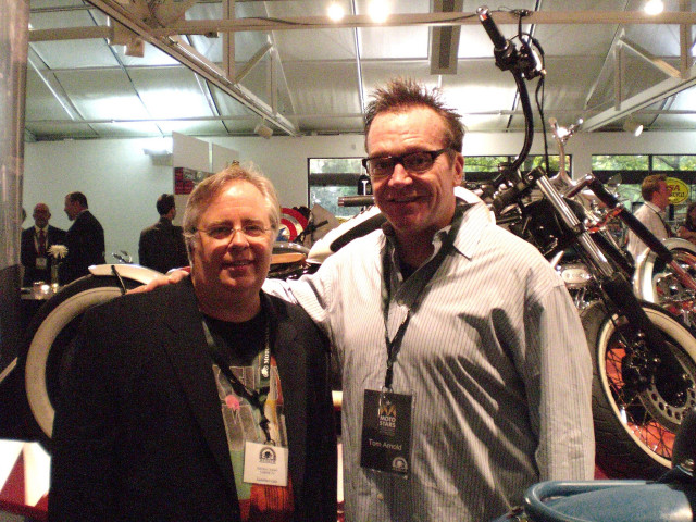 Two men motorcycles display room free wallpaper for desktop - medium preview image