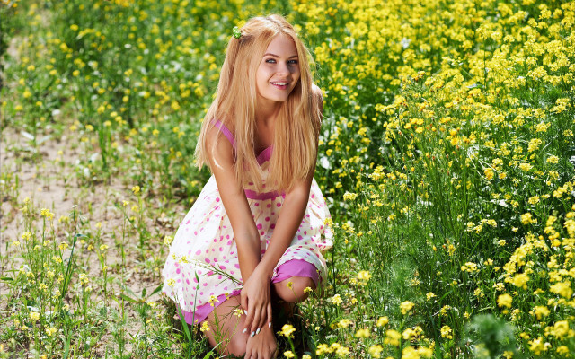 Woman sitting field flower smiling free wallpaper for desktop - medium preview image