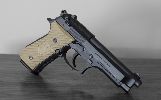 Gun wooden grip tabletop white free wallpaper for desktop - medium preview image