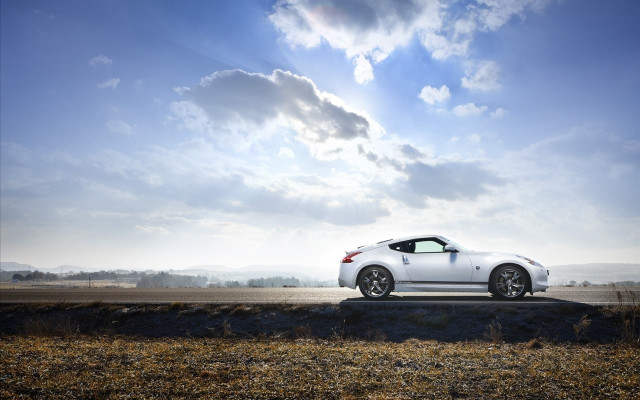 White sports car cloudy sky #20 free wallpaper for desktop - medium preview image
