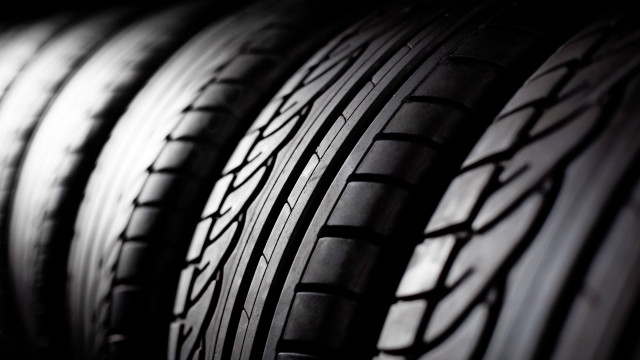 Tires lined up dark room free wallpaper for desktop - medium preview image
