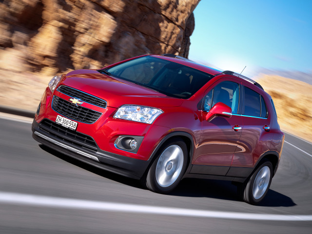Red chevrolet suv mountain road free wallpaper for desktop - medium preview image