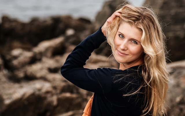 Woman longhair rocks water smiling free wallpaper for desktop - medium preview image