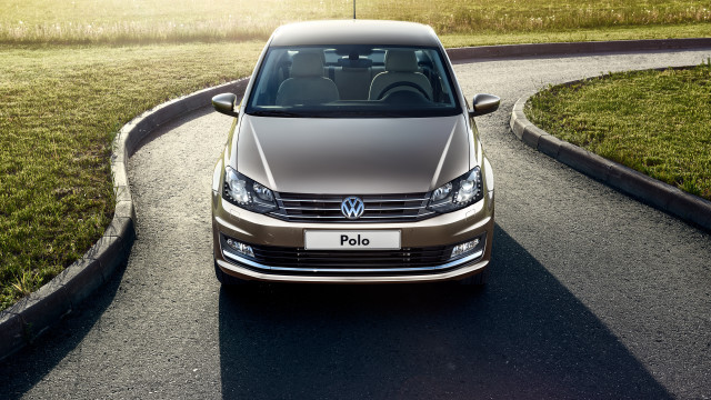 Brown car winding road green free wallpaper for desktop - medium preview image