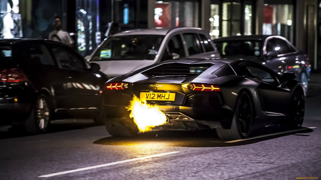Black sports car night yellow free wallpaper for desktop - medium preview image