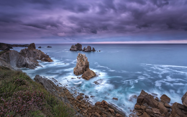 Rocky shore stormy sky water free wallpaper for desktop - medium preview image