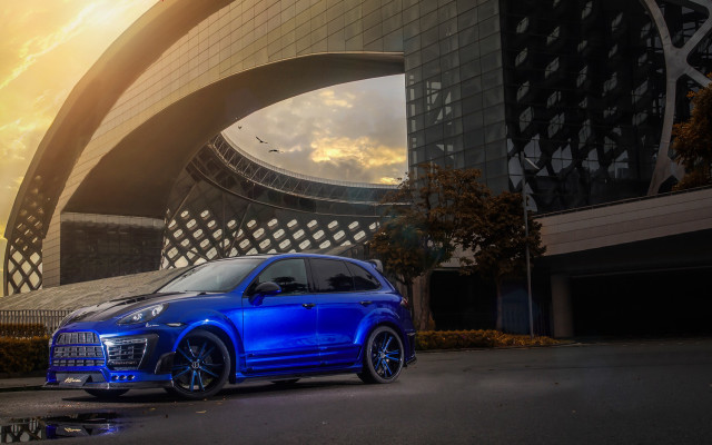 Blue car building sky bird free wallpaper for desktop - medium preview image