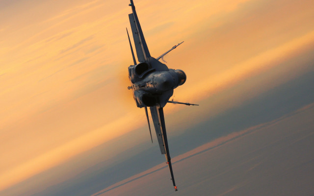 Fighter jet cloudy sunset backlit free wallpaper for desktop - medium preview image