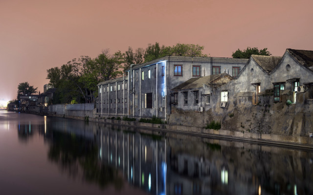 Dusk houses water pink sky free wallpaper for desktop - medium preview image