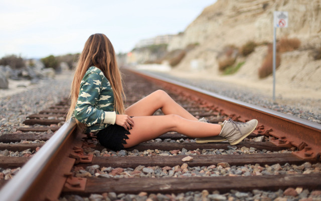 Traintrack sitting fashion blurry beach free wallpaper for desktop - medium preview image