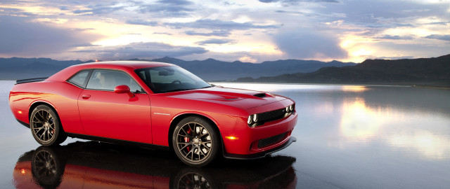 Red car reflective surface mountains free wallpaper for desktop - medium preview image