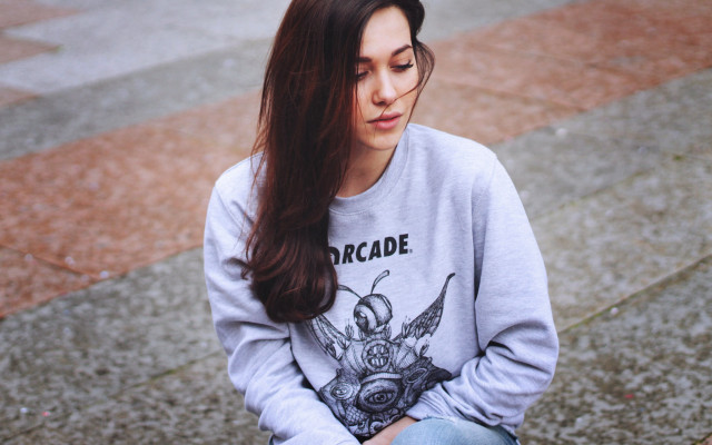 Woman curb sad phone beach free wallpaper for desktop - medium preview image