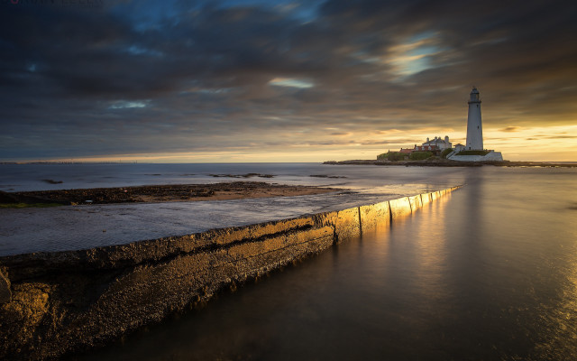 Lighthouse rocky shore sunset water #6 free wallpaper for desktop - medium preview image