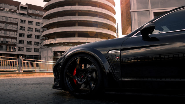 Black car tall building circular free wallpaper for desktop - medium preview image