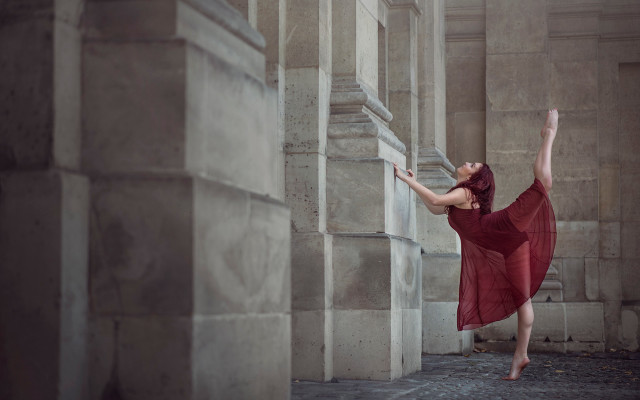 Woman red dress stretching wall free wallpaper for desktop - medium preview image