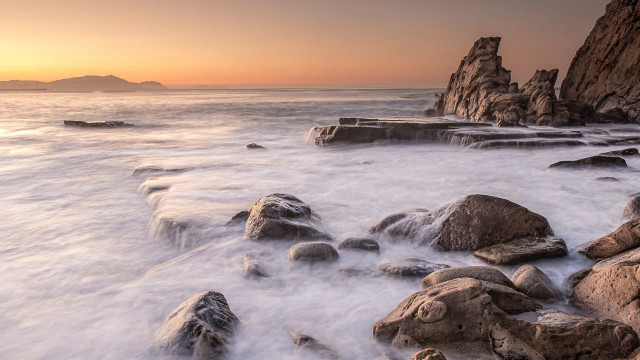 Rocky beach sunset island ocean #2 free wallpaper for desktop - medium preview image