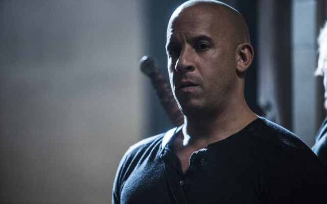 Bald man black shirt looking #2 free wallpaper for desktop - medium preview image