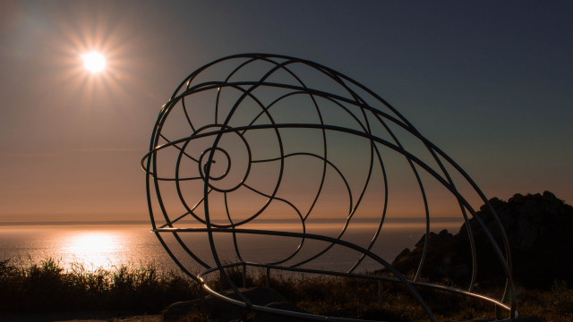 Sculpture ocean sunset abstract lensflare free wallpaper for desktop - medium preview image