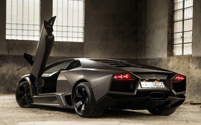 Black sports car garage door free wallpaper for desktop - medium preview image