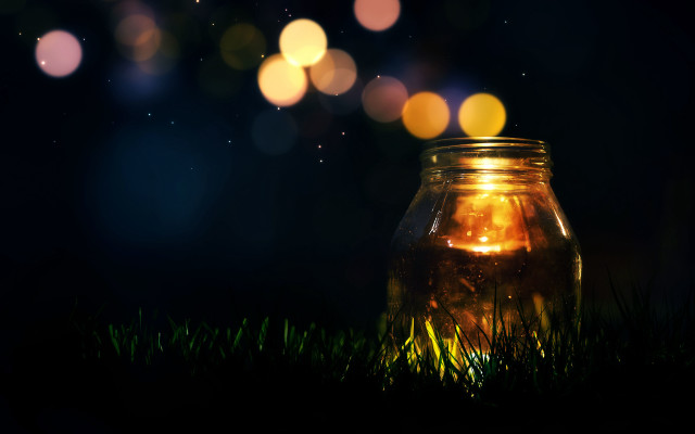 Glowing jar fireflies moonlight city free wallpaper for desktop - medium preview image