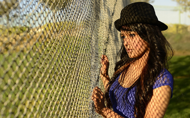 Woman fence hat greenfield portrait free wallpaper for desktop - medium preview image