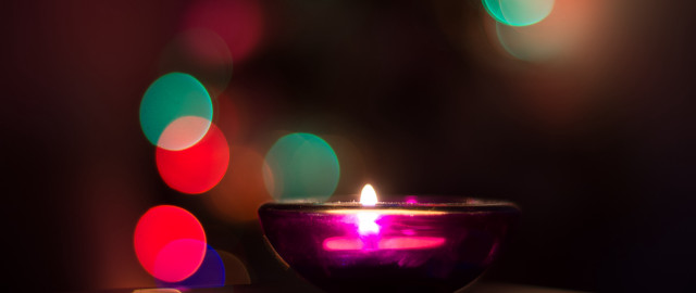 Lit candle bokeh macro glowing free wallpaper for desktop - medium preview image