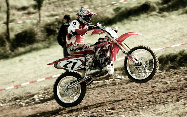 Man riding dirt bike forest free wallpaper for desktop - medium preview image