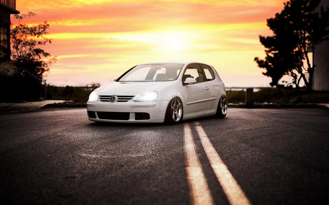 White car sunset autumn leaves free wallpaper for desktop - medium preview image