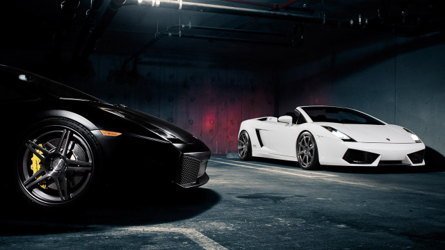 Two sports cars dark garage free wallpaper for desktop - medium preview image