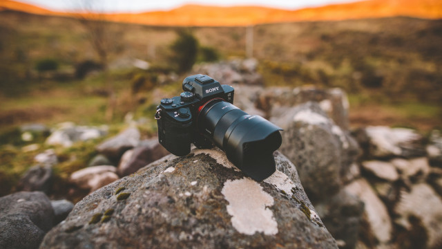 Camera rock field mountain tiltshift free wallpaper for desktop - medium preview image