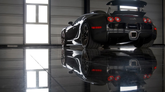 Black sports car garage hood free wallpaper for desktop - medium preview image