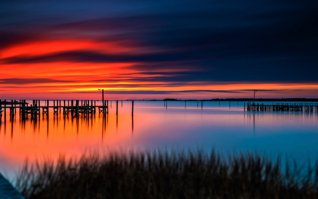 Sunset over water dock mystical free wallpaper for desktop - medium preview image