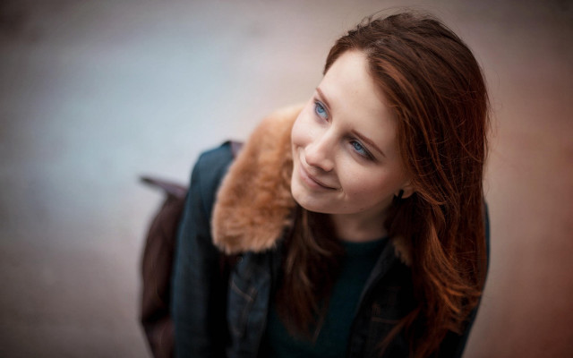 Woman backpack teddy smiling portrait free wallpaper for desktop - medium preview image