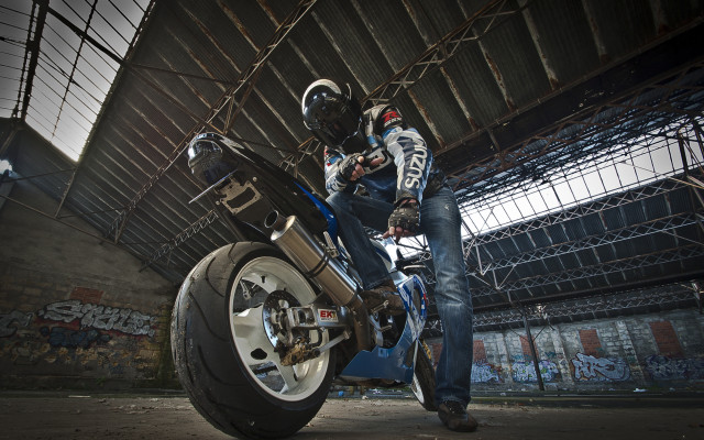 Warehouse motorcycle graffiti studio portrait free wallpaper for desktop - medium preview image