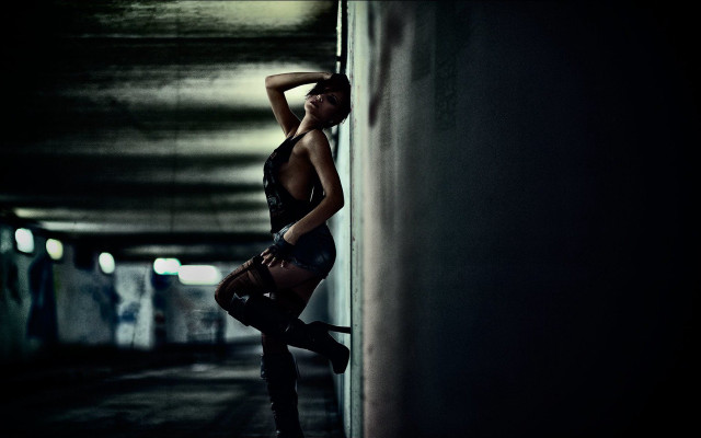 Woman black top boots leaning free wallpaper for desktop - medium preview image