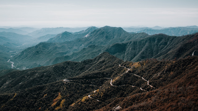 Mountain range winding road sunset #2 free wallpaper for desktop - medium preview image