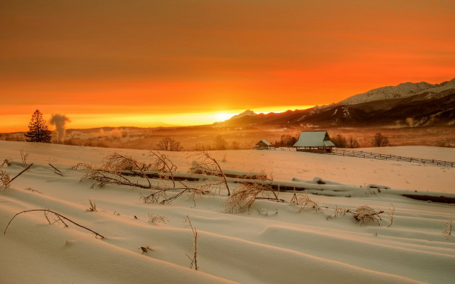 Snowy field barn mountains sunset free wallpaper for desktop - medium preview image