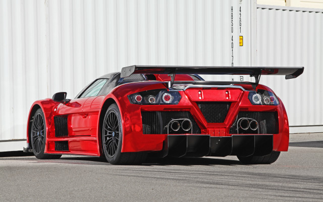 Red sports car white building #2 free wallpaper for desktop - medium preview image