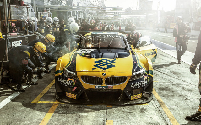 Yellow race car people helmet free wallpaper for desktop - medium preview image