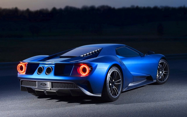 Blue sports car night driving free wallpaper for desktop - medium preview image