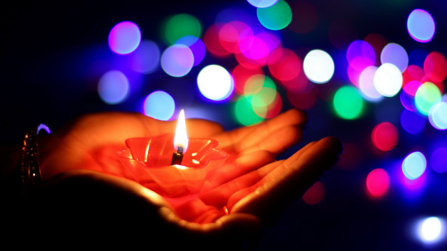 Candle lit person magic lights free wallpaper for desktop - medium preview image
