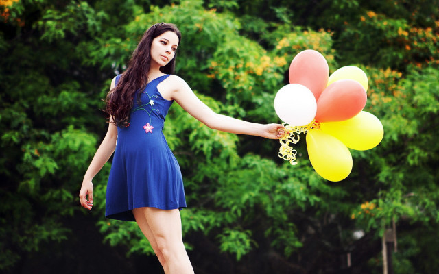Woman blue dress balloons smiling free wallpaper for desktop - medium preview image