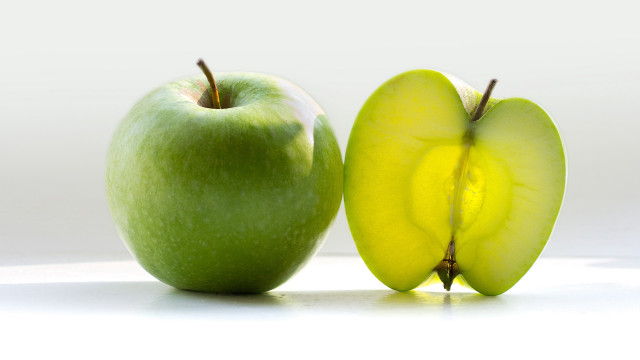 Green apple sliced conceptual product free wallpaper for desktop - medium preview image
